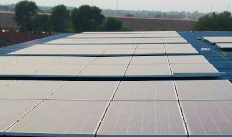 Rooftop Utility-Scale Solar Project - 910 kWp Solar Power Plant, Haryana, India